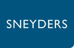Image of a blue rectangular sign with the word "SNEYDERS" written in white capital letters.
