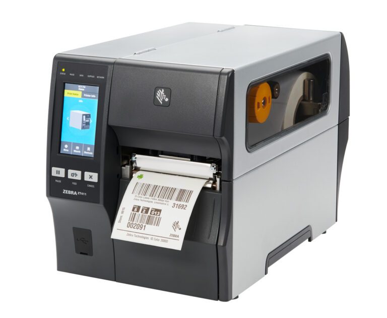 A Zebra ZT411 industrial barcode label printer with a partially printed label emerging from the front. The display screen shows printer settings and an image of the label being printed, ensuring precise marking and coding for all your labeling needs.